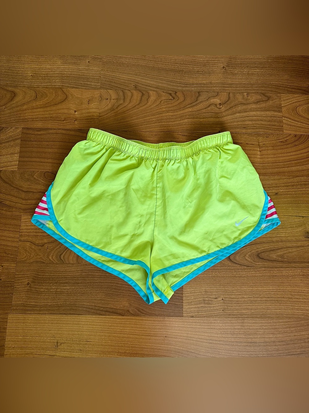 Nike Women's Neon Green Running Shorts with Blue Trim and Pink Stripe Detail